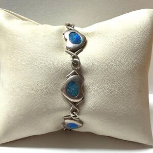 Chic Silver Bracelet with Blue Heart Accents